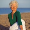 Collagen, a better framework than calcium alone Senior woman enjoying yoga on the beach
