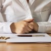 Put the Script Pad Down: FDA’s New Drug Approvals Pose Significant Risks doctor detail with pills and prescription